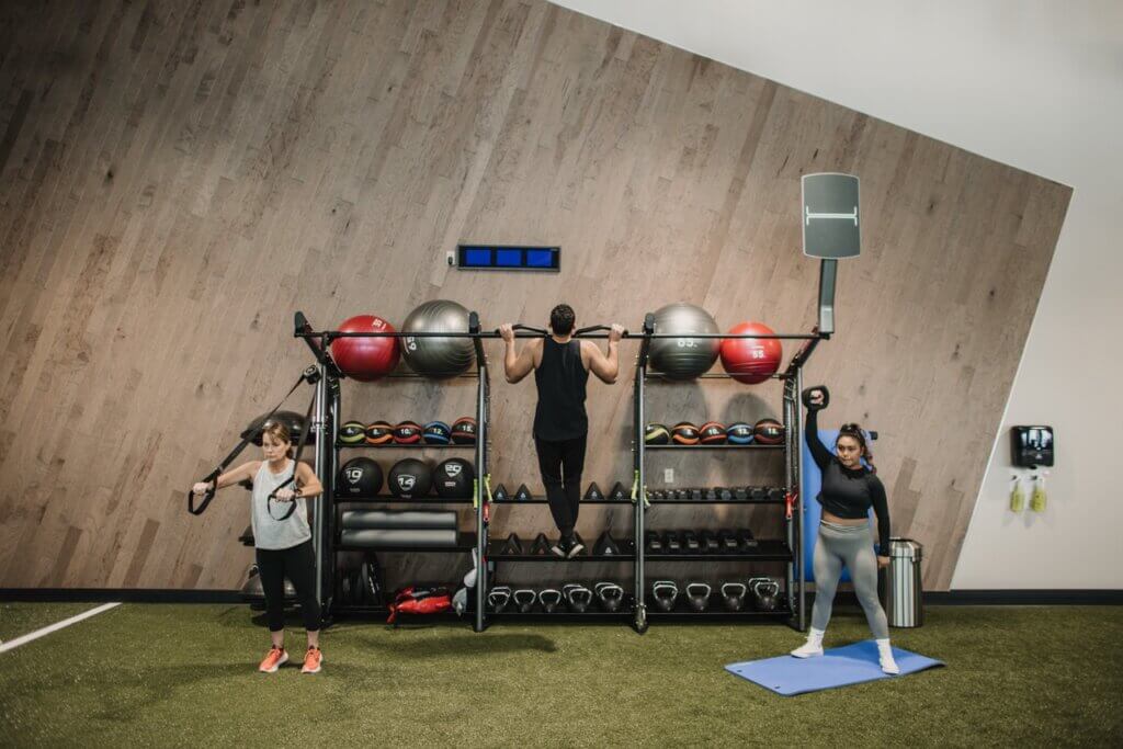 People exercising in a modern gym
